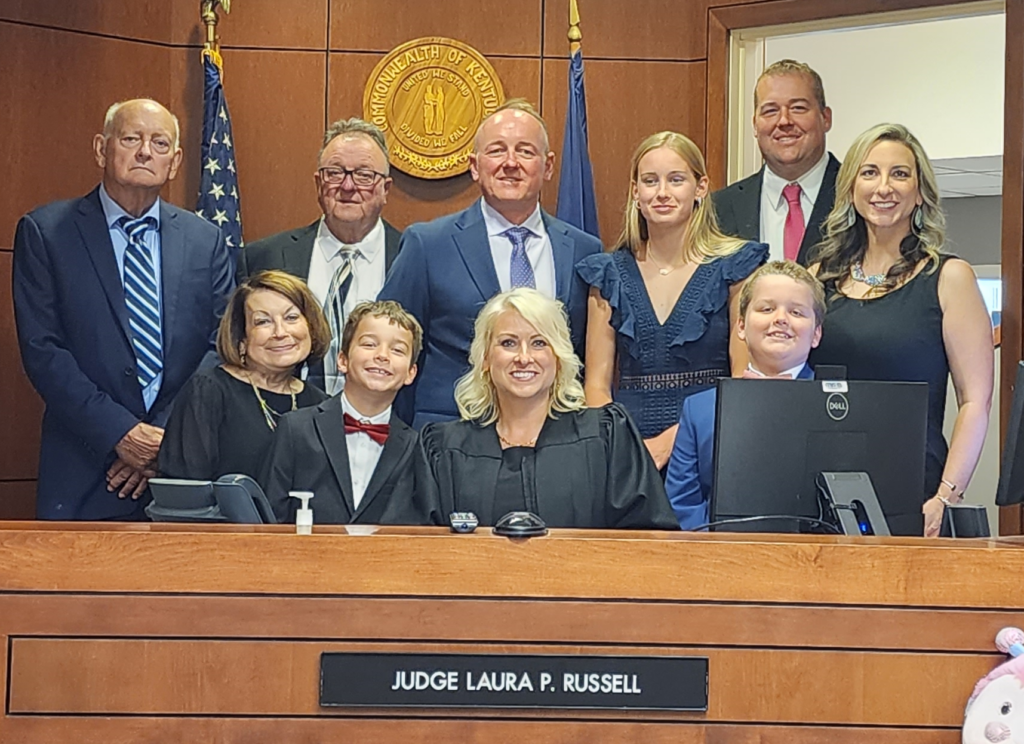 Judge Laura Russell family around the bench